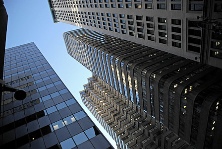 low angle photo of concrete high-rise buildings thumbnail