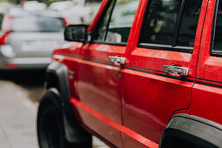 Old red Jeep Cherokee thumbnail