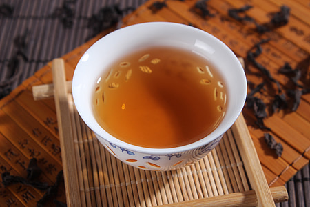round white and blue bowl on brown wooden tray thumbnail