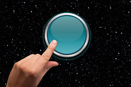 person pushing round green button thumbnail