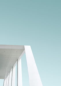 white concrete building under clear sky thumbnail