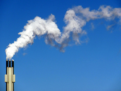 beige pipe bleaching smoke on blue sky thumbnail