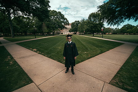 man standing on gray concrete ground thumbnail
