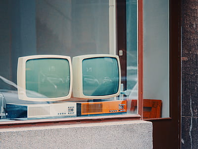 white CRT monitors on glass display thumbnail