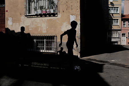 shadow of boys on wall thumbnail