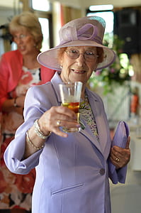 shallow focus photo of a woman in purple notched lapel suit jacket thumbnail