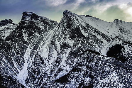 snow covered mountain during daytime thumbnail