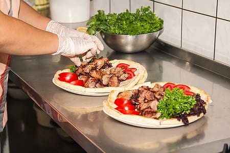 person preparing meat meal thumbnail
