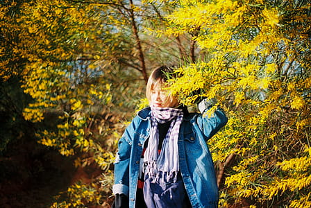 Photography of Woman Near Leaves thumbnail