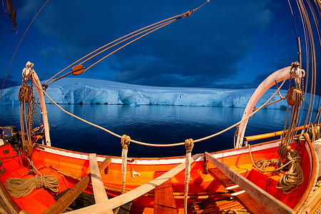 boat on body of water during dawn thumbnail