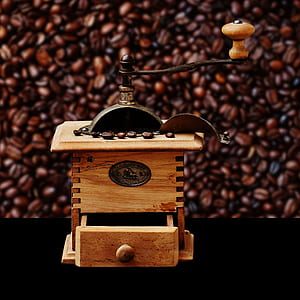 brown wooden manual coffee grinder thumbnail