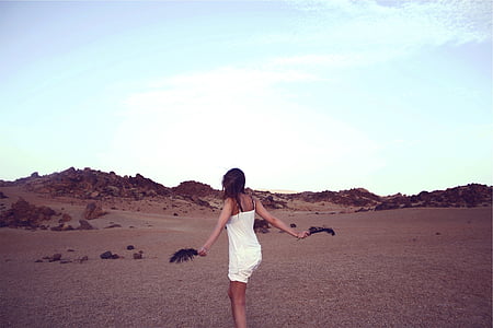 woman standing on ground at daytime thumbnail