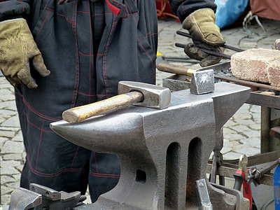 person holding tongs thumbnail
