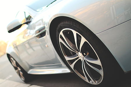Super luxury silver car parked on the street thumbnail