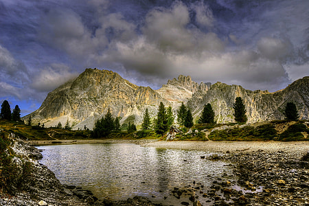 body of water across mountain thumbnail