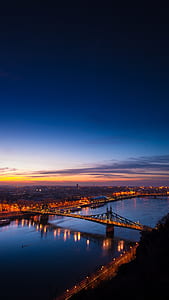 aerial photo of bridge and city with lights thumbnail