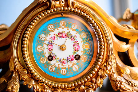 brown floral clock displaying 12:50 thumbnail