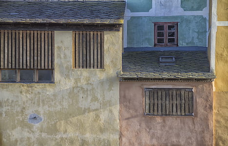 beige and brown concrete buildings thumbnail
