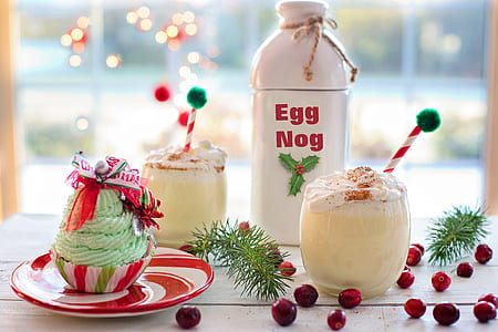 cupcake served on saucer and two milk whip creams in drinking glasses thumbnail