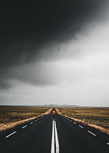 person running in the middle of road thumbnail