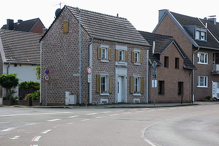 photography of brown building during daytime thumbnail