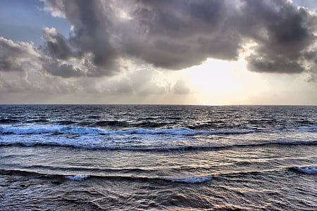 seashore under gray sky thumbnail