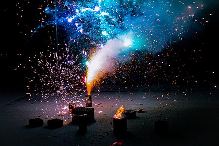 fireworks on ground giving out smoke thumbnail