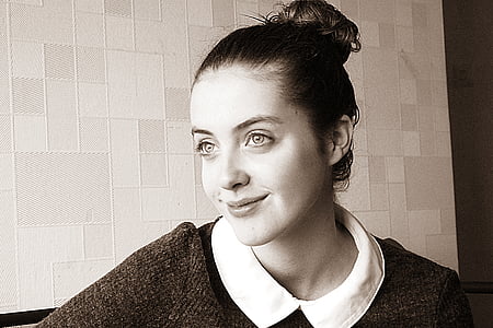 grayscale photo of woman wearing collared shirt thumbnail