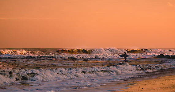 person standing on body of water thumbnail