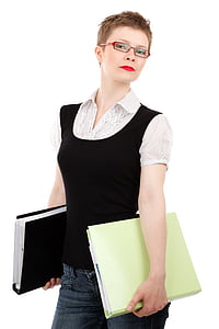 woman wearing black tank top and white button-up shirt holding green folder thumbnail