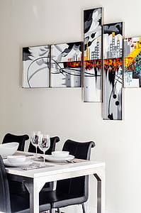 abstract painting near dining table thumbnail