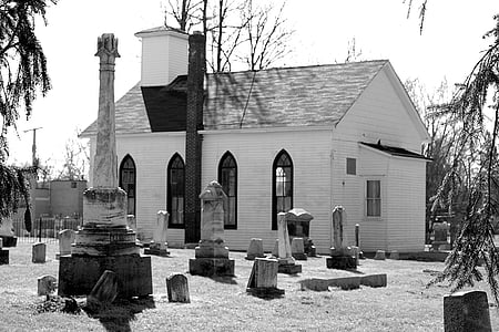 grayscale photo of house beside trees thumbnail
