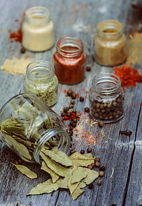 clear glass mason jars filled with assorted spices thumbnail