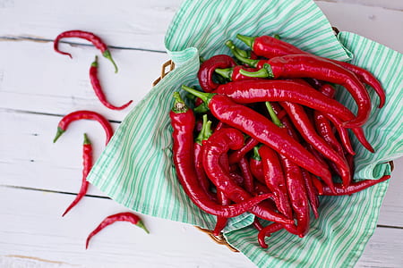 red chili lot on top of teal textile thumbnail