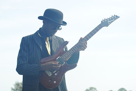man playing electric guitar thumbnail