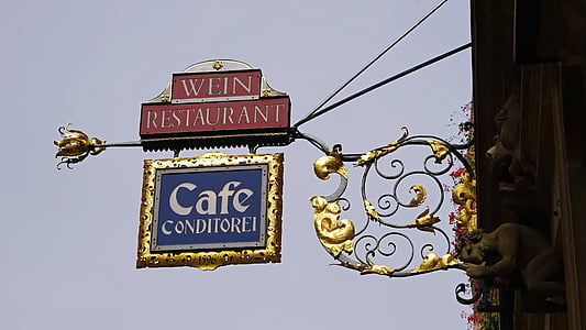 Wein Restaurant Cafe Conditorei signage during daytime thumbnail