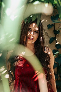 selective focus photography of smiling woman at garden thumbnail