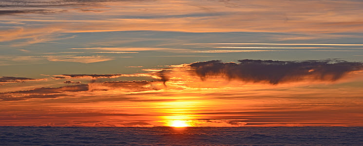 body of water under red sky thumbnail
