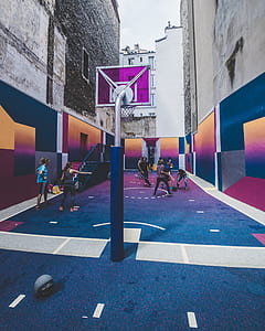 group of people playing in basketball court thumbnail