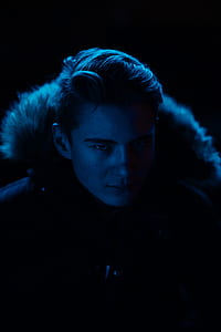 man wearing black fur coat thumbnail