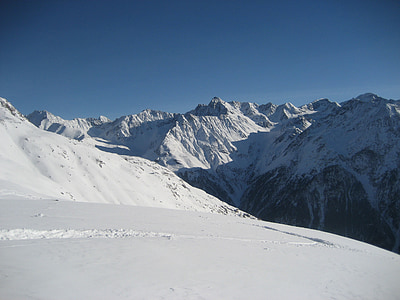 mountains covered with snow at daytime thumbnail