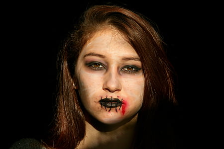 brown haired woman wearing makeup thumbnail