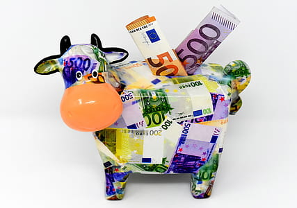 multicolored ceramic cow coin bank thumbnail