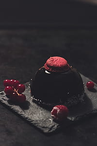 chocolate cake with cherries and French macaroons thumbnail