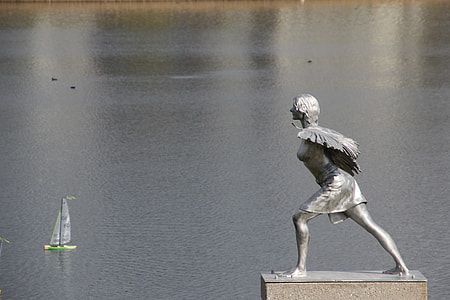 woman statue near body of water at daytime thumbnail