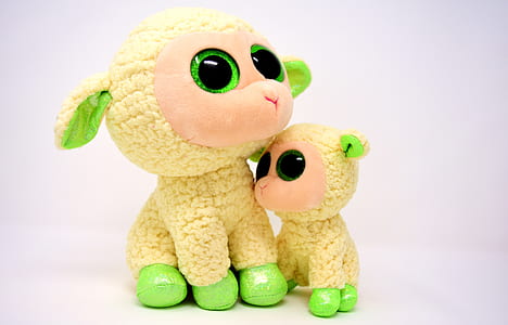 two yellow-and-green sheep plush toys thumbnail