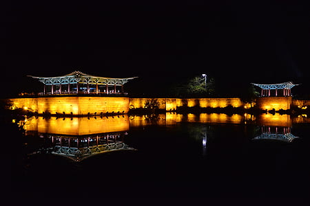 black and orange pagoda during night thumbnail