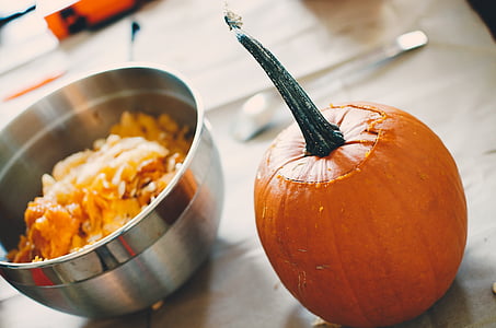 pumpkin near bowl on table thumbnail