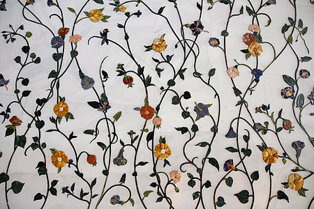white, orange, and yellow floral textile thumbnail