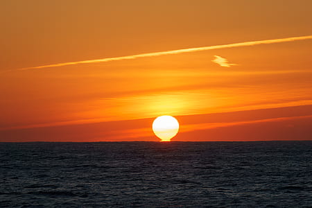 sun over the sea during golden hour thumbnail